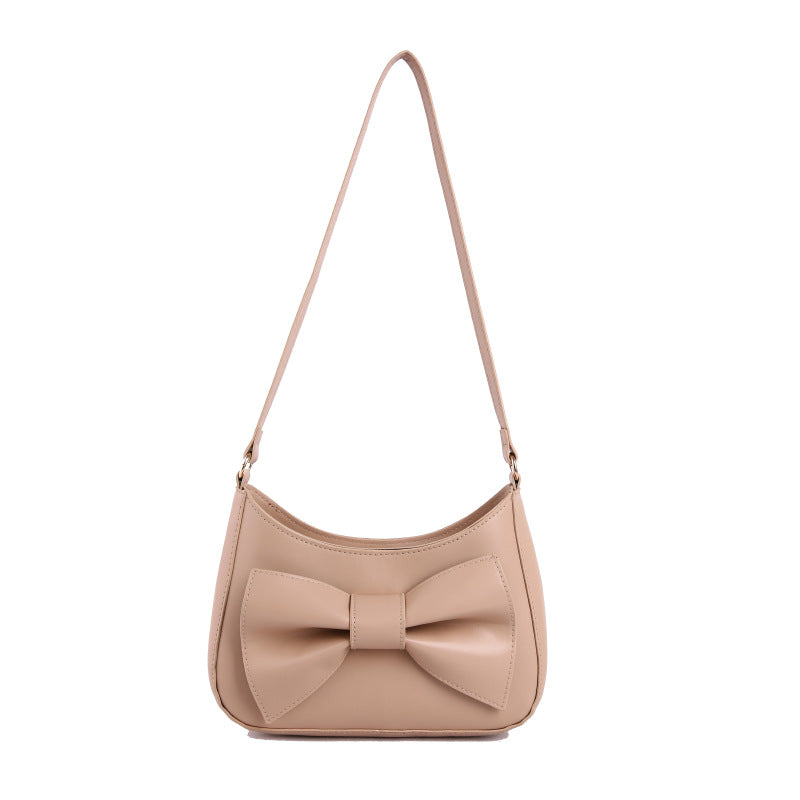 The Juliette Bow Faux-Leather Shoulder Bag in Beige