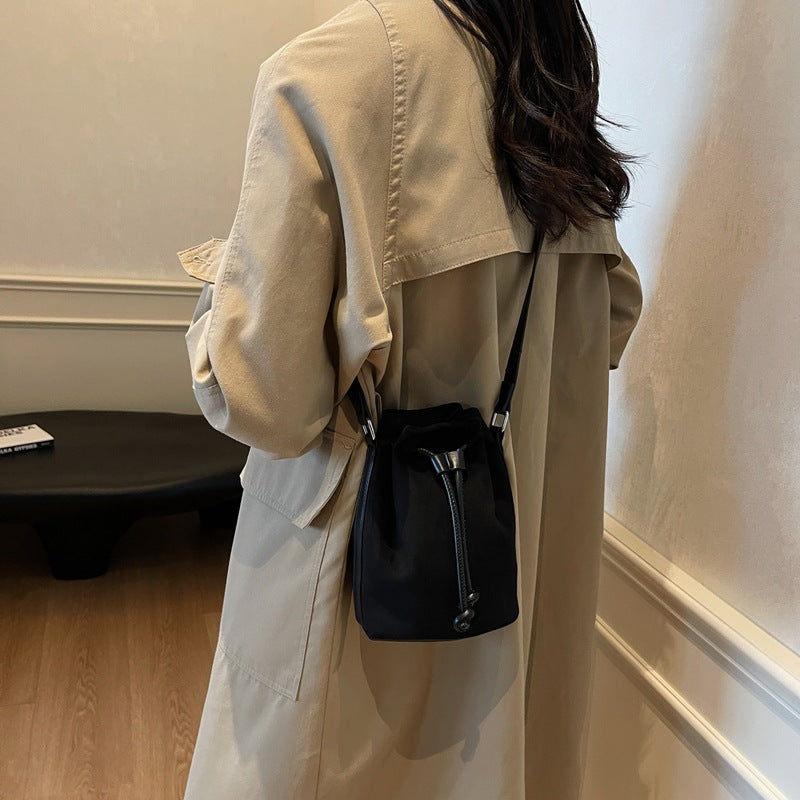 The Sienna Faux-Suede Drawstring Bucket Bag, photo 2