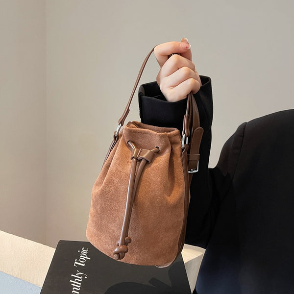 The Sienna Faux-Suede Drawstring Bucket Bag, photo 1