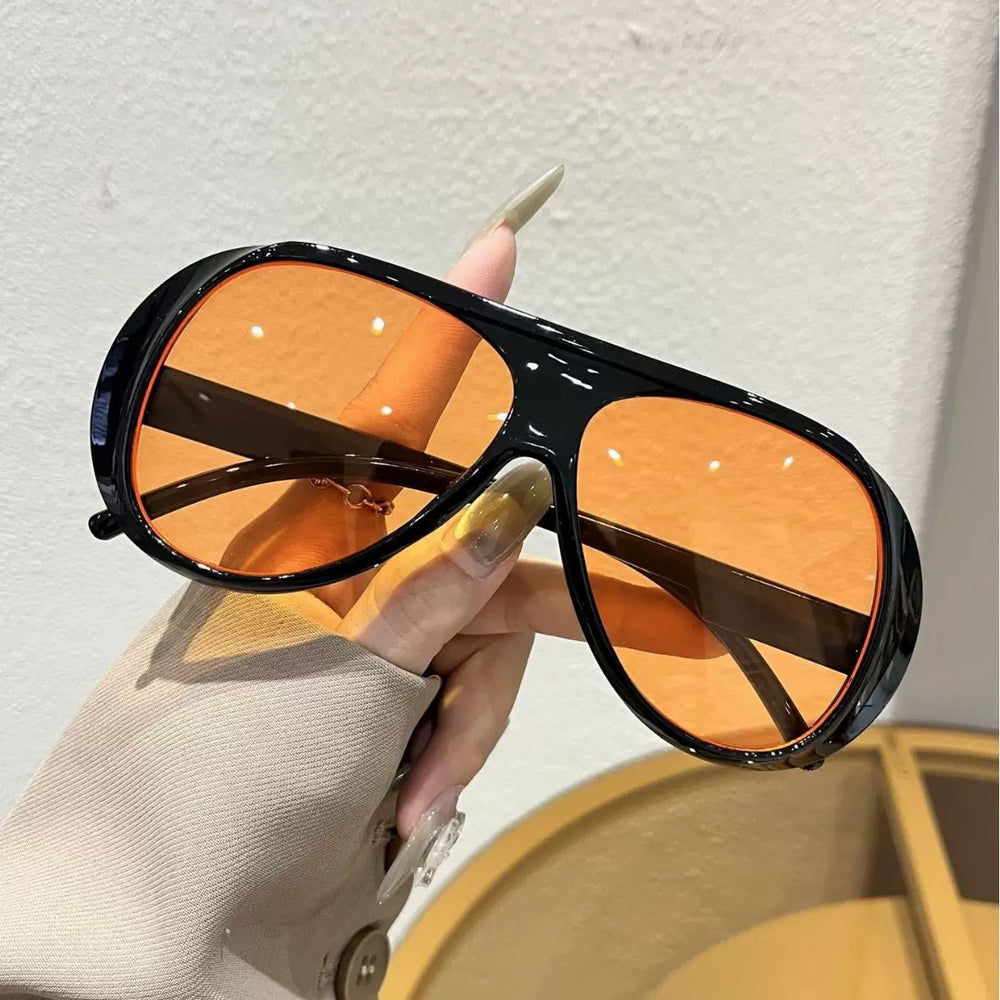 The Capri Oversized Aviator Sunglasses in Black / Amber Lens