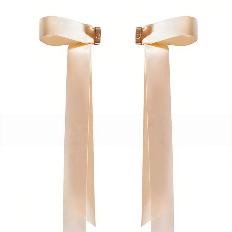 The Belle Ribbon Bow Hair Clip in Champagne Pink
