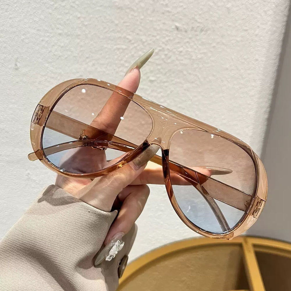 The Capri Oversized Aviator Sunglasses in Clear Tea / Blue Lens