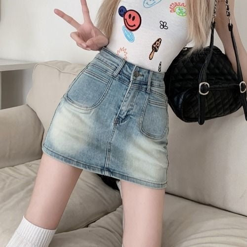 The Jolene Vintage-Wash Stretch Denim Mini Skirt in Light Blue Wash