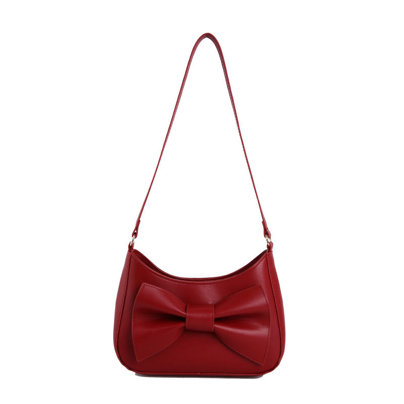 The Juliette Bow Faux-Leather Shoulder Bag in Cherry Red